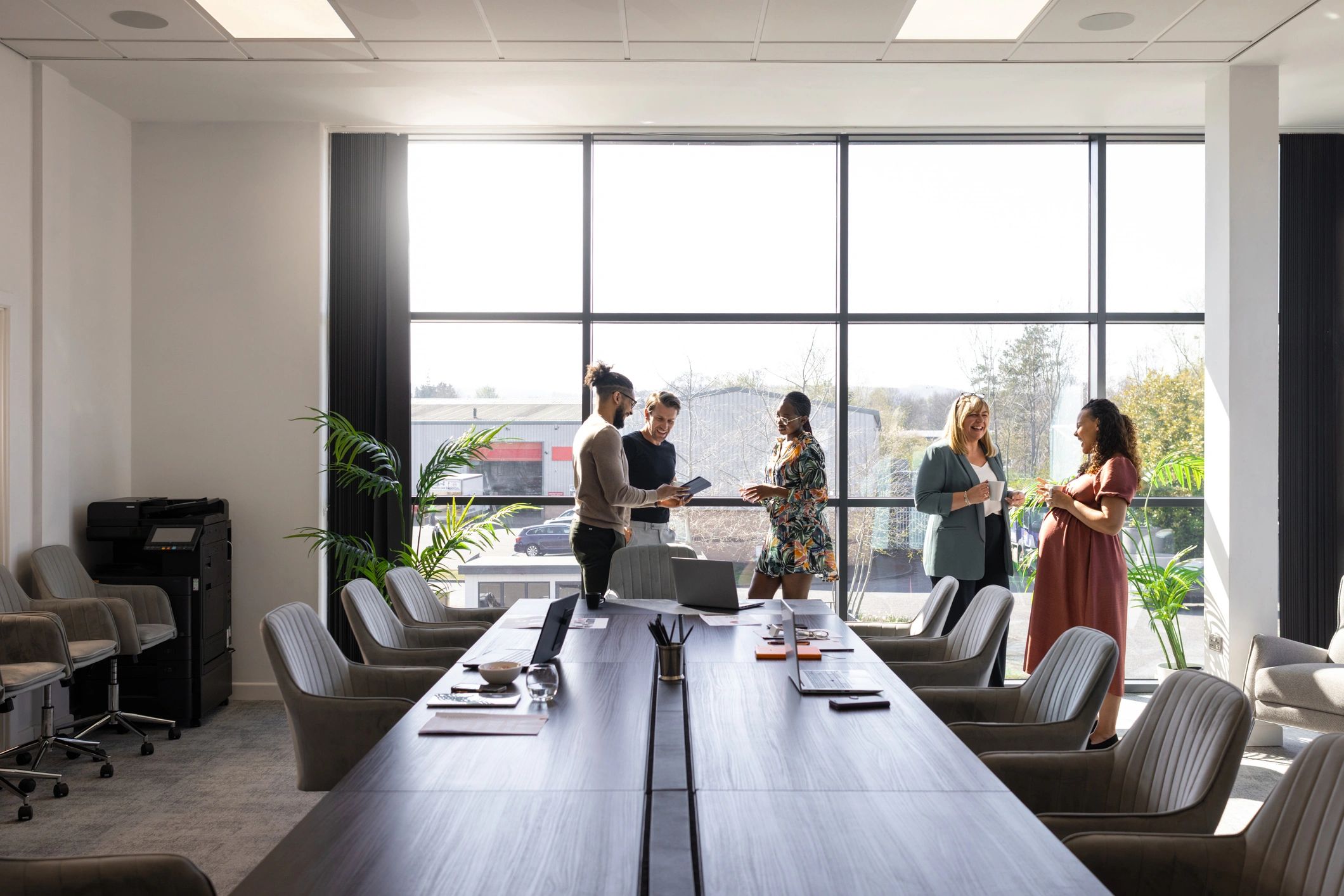 Leadership team aligning on priorities in a conference room